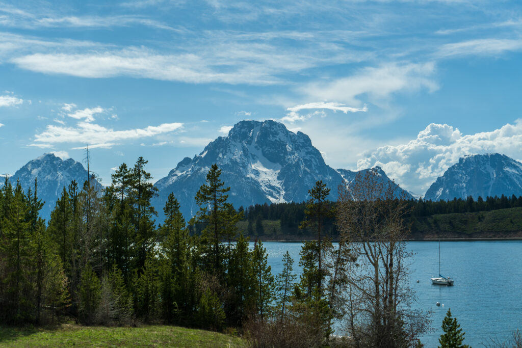 Snow sits on the Tetons mountains during a clear May day. 