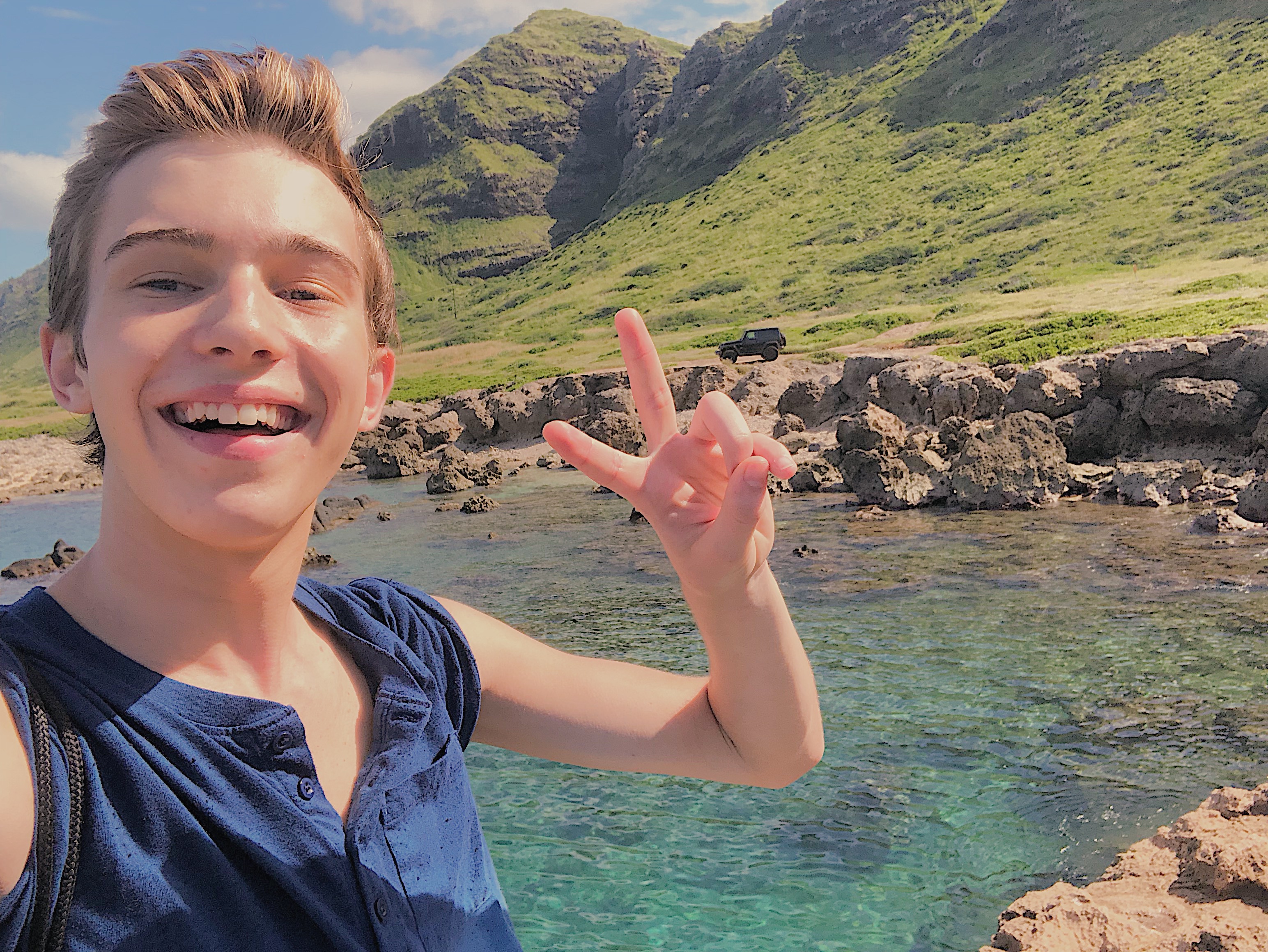 Noah takes a selfie during his solo hike to Ka'ena Point. 