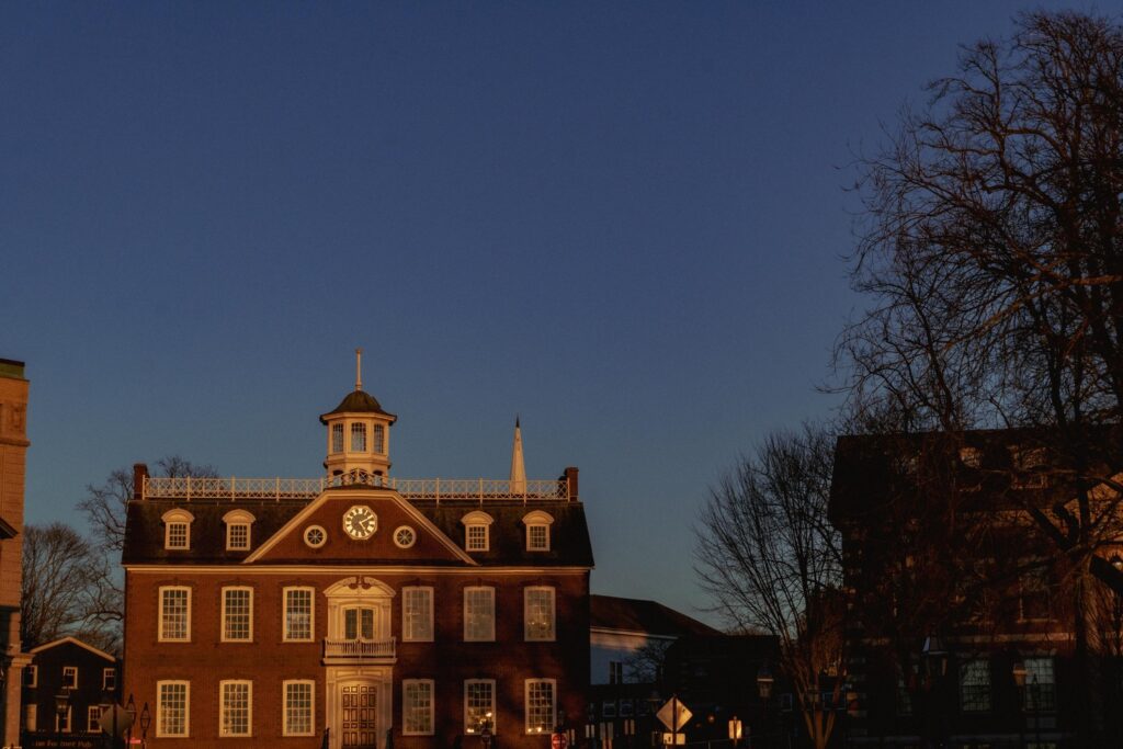 Newport's Old State Colony House  glows at sunset. It is a great place to add to your Rhode Island Travel Guide.