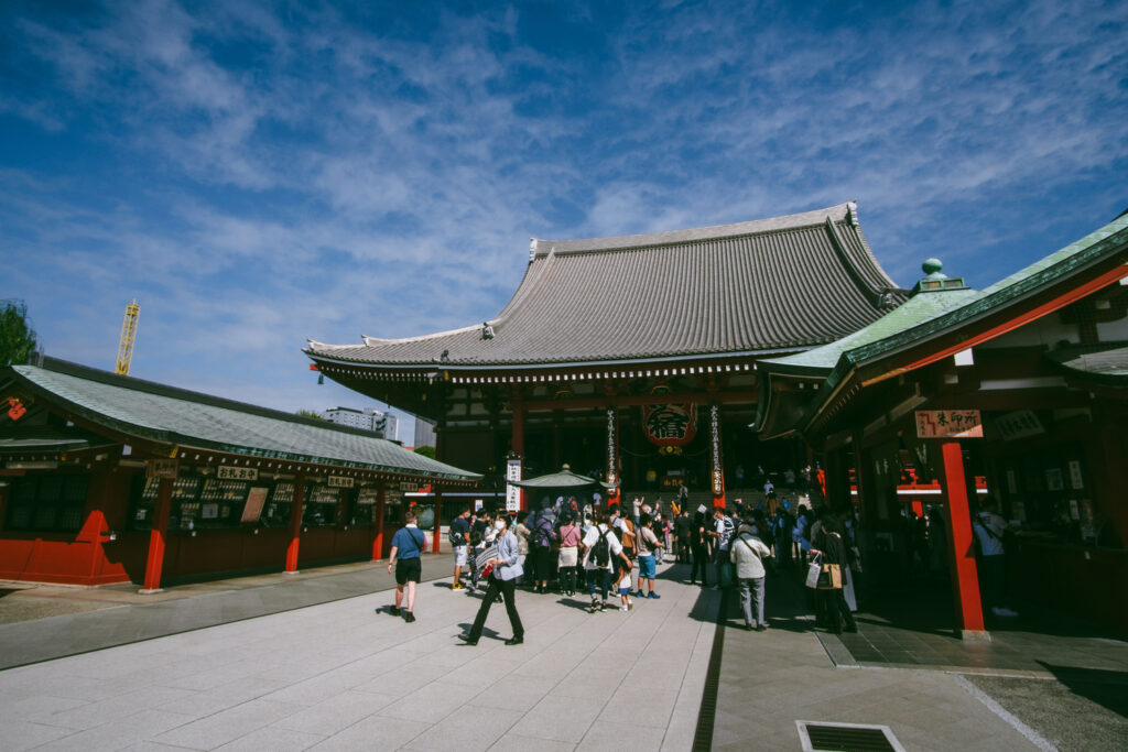 Tourist visit a Sensoji Temple during their solo tokyo travel itinerary. 
