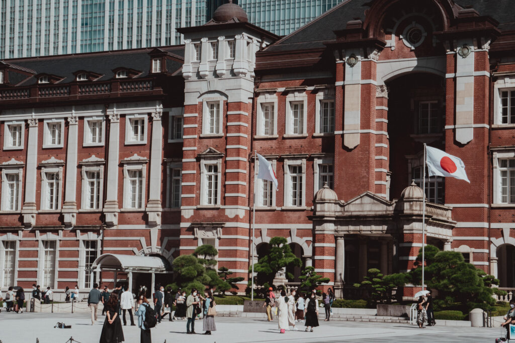 People walk into Tokyo Station. 
