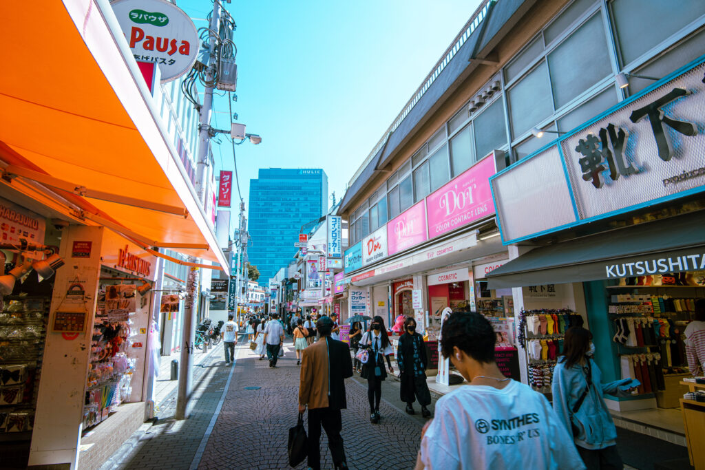 Shoppers fill the street at Takeshita Street in Harajuku. 