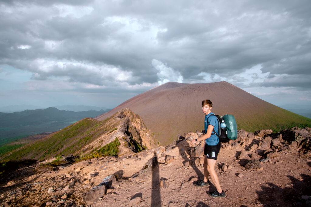 Noah takes the world is on a solo hike Mt. Asama in Japan.