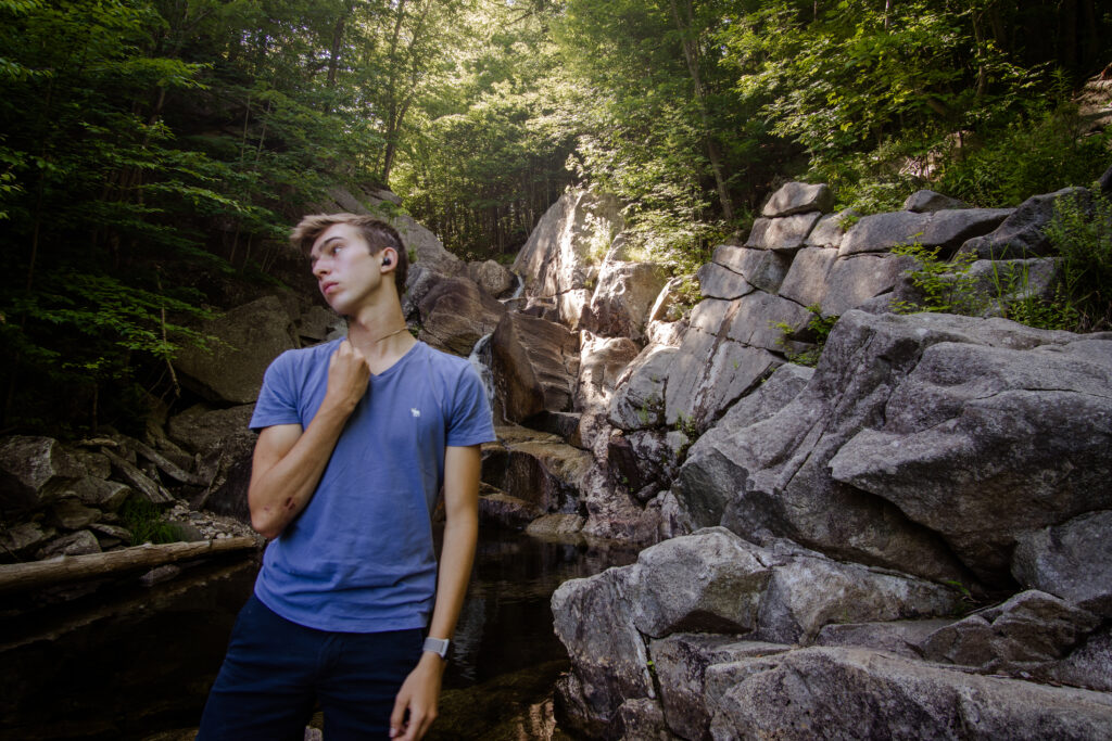 Noah poses on a hike in Vermont. 