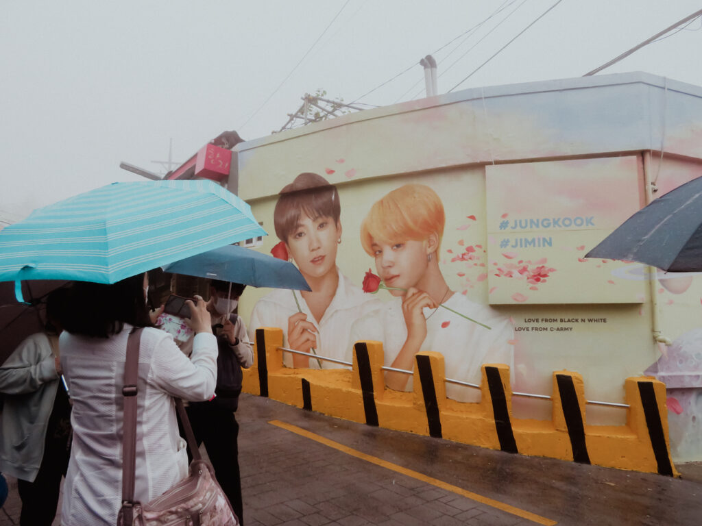 the BTS mural in the Gamcheon Culture Village is a must see during a solo trip to Busan