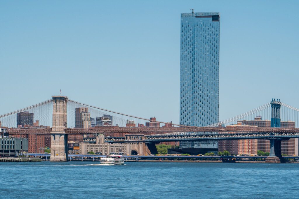 A view of the Brooklyn Bridge and United Nations Building. Seeing these monuments is a must do for any solo trip to NYC