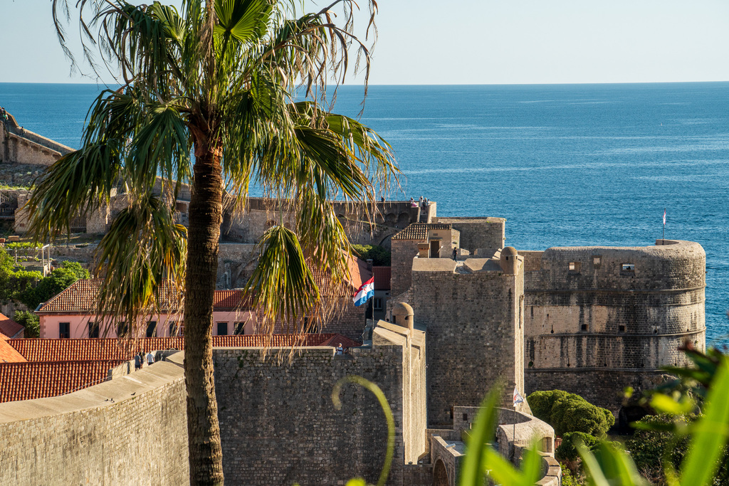 Dubrovnik is surrounded by medieval walls. This city is very popular on this one-month balkans travel itinerary. 