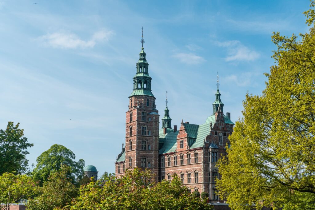 Rosenborg Castle and King's Garden frame the sky in a beautifiul sunny day in Denmark, Copenhagen.