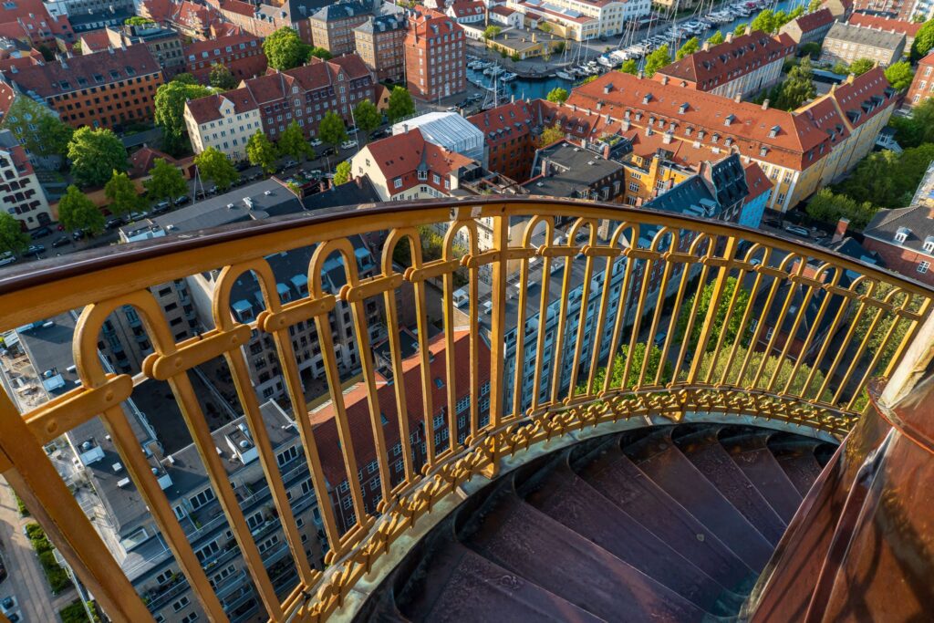 Steps circle up the spire of Vor Frelsers Kirke, or the Church of Our Saviour. This is a fun tourist activity to do during a solo trip to Copenhagen.
